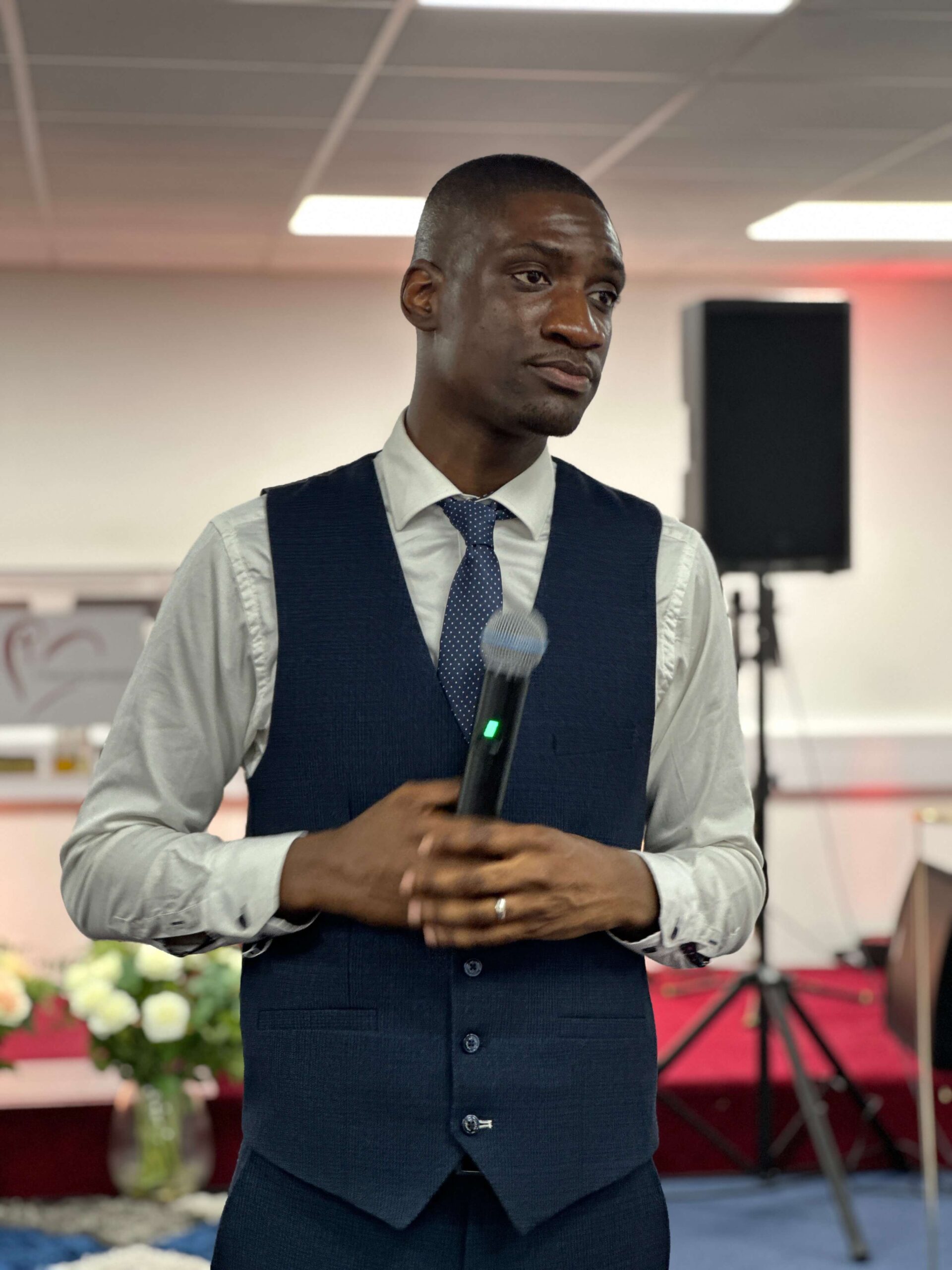 Pastor Sam preaching