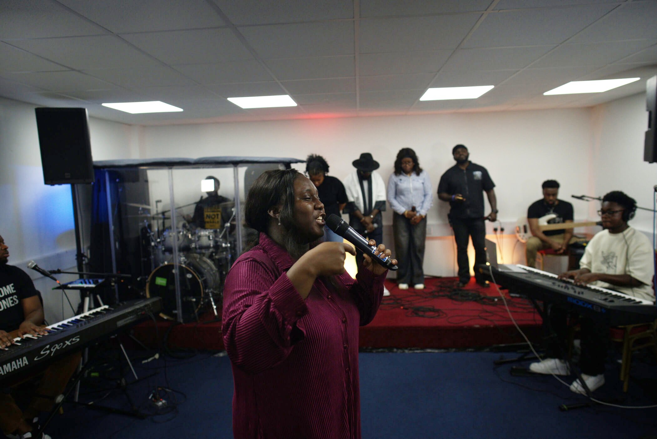 Woman preaching in service